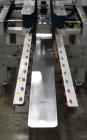 Used Belcor 150 Top and Bottom Case Tape Sealer, Model BEL 150SF. Rated up to 30 cases per minute. Case size range: 8