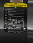 Used Belcor 150 Top and Bottom Case Tape Sealer, Model BEL 150SF. Rated up to 30 cases per minute. Case size range: 8