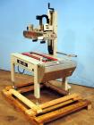 Used Belcor (Wexxar) Model 185 automatic random top case taper sealer. Capable of speeds up to 20 cases per minute. Has a case size range: 8