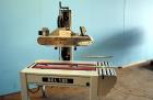 Used Belcor (Wexxar) Model 185 automatic random top case taper sealer. Capable of speeds up to 20 cases per minute. Has a case size range: 8