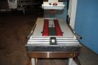 Used Belcor (Wexxar) Model 185 automatic random top case taper sealer. Capable of speeds up to 20 cases per minute. Has a case size range: 8
