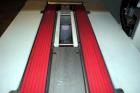 Used Belcor (Wexxar) Model 185 automatic random top case taper sealer. Capable of speeds up to 20 cases per minute. Has a case size range: 8