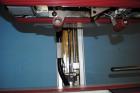 Used Belcor (Wexxar) Model 185 automatic random top case taper sealer. Capable of speeds up to 20 cases per minute. Has a case size range: 8