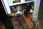 Used Belcor (Wexxar) Model 185 automatic random top case taper sealer. Capable of speeds up to 20 cases per minute. Has a case size range: 8