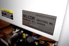Used Belcor (Wexxar) Model 185 automatic random top case taper sealer. Capable of speeds up to 20 cases per minute. Has a case size range: 8