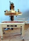 Used Belcor (Wexxar) Model 185 automatic random top case taper sealer. Capable of speeds up to 20 cases per minute. Has a case size range: 8