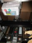 Used Wexxar (Belcor) top and bottom case sealer.