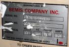 Used Bemis Semi-Automatic Uniform Top /Bottom Case Taper, Model 1018SA, carbon steel. Capable of speeds up to 28 CPM. Has side belt transfers and a case size range: length 4-1/2