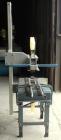 Used EZ-Tek Top and Bottom EZ-Taper Case Sealer, Model BB-2, Carbon Steel. Up to 30 cases per minute, minimum case size: length 4.5
