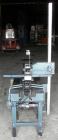 Used EZ-Tek Top and Bottom EZ-Taper Case Sealer, Model BB-2, Carbon Steel. Up to 30 cases per minute, minimum case size: length 4.5