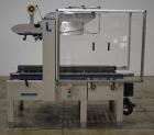 Used Interpack UA 262024-SB Uniform Automatic Case Sealer. Capable of up to 12 cases per minute. Size range of 6 to 26