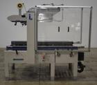 Used- Interpack UA 262024-SB Uniform Automatic Case Sealer. Capable of up to 12 cases per minute. Size range of 6 to 26