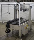 Used- Interpack UA 262024-SB Uniform Automatic Case Sealer. Capable of up to 12 cases per minute. Size range of 6 to 26