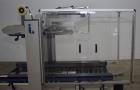 Used- Interpack UA 262024-SB Uniform Automatic Case Sealer. Capable of up to 12 cases per minute. Size range of 6 to 26