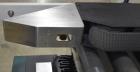 Used Interpack UA 262024-SB Uniform Automatic Case Sealer. Capable of up to 12 cases per minute. Size range of 6 to 26