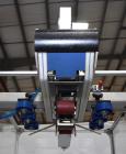 Used Interpack UA 262024-SB Uniform Automatic Case Sealer. Capable of up to 12 cases per minute. Size range of 6 to 26