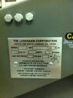 Used Little David (Loveshaw) Model LD-16SB Case Taper. Unit is capable of speeds up to 60 feet per minute. Is currently set up with top tape head only (has provisions for bottom tape head). Has a cas...
