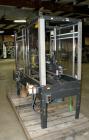 Used Loveshaw Little DavidTop And Bottom Automatic Case Sealer, Model LD16A. Capable of speeds up to 60 feet per minute or 14 cases per minute. Case size range: (length) 8-1/2