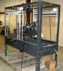 Used Loveshaw Little DavidTop And Bottom Automatic Case Sealer, Model LD16A. Capable of speeds up to 60 feet per minute or 14 cases per minute. Case size range: (length) 8-1/2