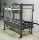Used Loveshaw Little David Model LD16A Top and Bottom Automatic Case Sealer. Missing (1) tape head. Capable of speeds up to 60 feet per minute or 14 cases per minute. Case size range: (length) 8-1/2