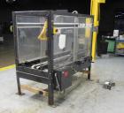 Used Loveshaw Little David Model LD16A Top and Bottom Automatic Case Sealer. Missing (1) tape head. Capable of speeds up to 60 feet per minute or 14 cases per minute. Case size range: (length) 8-1/2