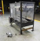 Used Loveshaw Little David Model LD16A Top and Bottom Automatic Case Sealer. Missing (1) tape head. Capable of speeds up to 60 feet per minute or 14 cases per minute. Case size range: (length) 8-1/2