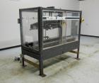 Used Loveshaw Little David Model LD16A Top and Bottom Automatic Case Sealer. Missing (1) tape head. Capable of speeds up to 60 feet per minute or 14 cases per minute. Case size range: (length) 8-1/2