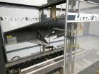 Used Loveshaw Little David Model LD16A Top and Bottom Automatic Case Sealer. Missing (1) tape head. Capable of speeds up to 60 feet per minute or 14 cases per minute. Case size range: (length) 8-1/2