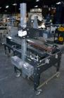 Used Little David SP304 top and bottom case sealer. Operating speed up to 72' per minute. Side belt drives with a case size range: (Length)6