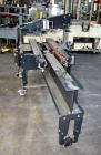 Used Little David SP304 top and bottom case sealer. Operating speed up to 72' per minute. Side belt drives with a case size range: (Length)6