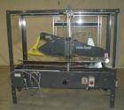 Used Loveshaw Little David Model LD16A Top and Bottom Automatic Case Sealer. Caspable of speeds up to 60 feet per minute or 14 cases per minute. Case size range: (length) 8-1/2