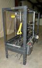 Used Loveshaw Little David Model LD16A Top and Bottom Automatic Case Sealer. Caspable of speeds up to 60 feet per minute or 14 cases per minute. Case size range: (length) 8-1/2