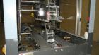 Used Loveshaw Little David Model LD16A Top and Bottom Automatic Case Sealer. Caspable of speeds up to 60 feet per minute or 14 cases per minute. Case size range: (length) 8-1/2