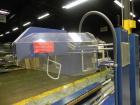 Used Durable Packaging Model RM-32FCAS Case Sealer. Machine is capable of speeds up to 40 cases per minute.Case size range: unlimited (length), 5