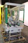 Used Sekisui TA Industries Model STA-XF50 Random Automatic Flap Closing and Taping Machine.  Up to 8 cases per minute.  Case size range:  length 7.87” to 31.5”, width 4.33” to 19.96”, height 3.94” to...