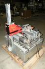 Used Soco Systems Top and Bottom Case Taper, Model T-10. Capable of speeds up to 30 cases per minute. Semi automatic operation, with side belts to pull case through tape heads. Case size range: lengt...