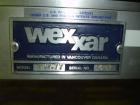 Used Wexxar WST-77 Automatic Top and Bottom Case Sealer. Capable of speeds up to 35 cases per minute. Case size range: length 12