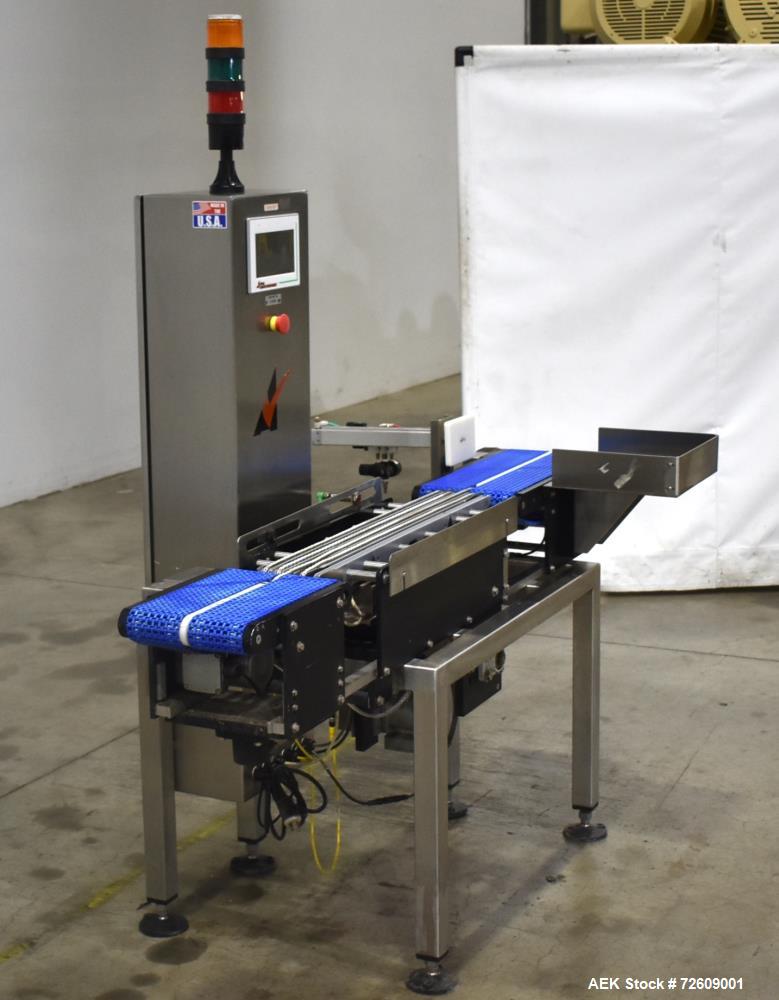 Used Alpha (All-Fill) Model CW-10 Checkweigher. Capable of speeds up to 250 packages per minute. Can handle package weights up to 9 lbs with dimensions up to 15" (long) X 10" (wide). Rated with a +/-...