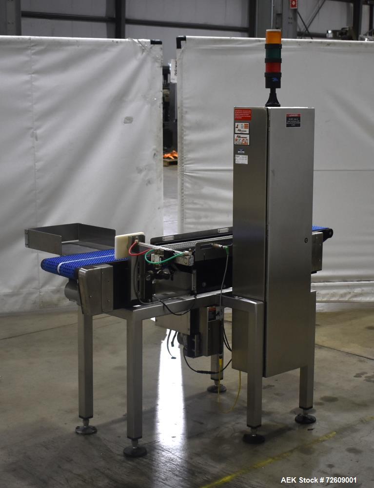 Used Alpha (All-Fill) Model CW-10 Checkweigher. Capable of speeds up to 250 packages per minute. Can handle package weights up to 9 lbs with dimensions up to 15" (long) X 10" (wide). Rated with a +/-...