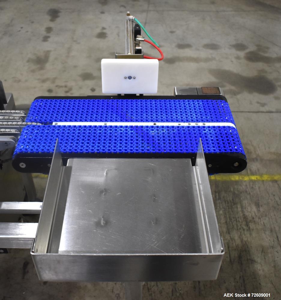 Used Alpha (All-Fill) Model CW-10 Checkweigher. Capable of speeds up to 250 packages per minute. Can handle package weights up to 9 lbs with dimensions up to 15" (long) X 10" (wide). Rated with a +/-...