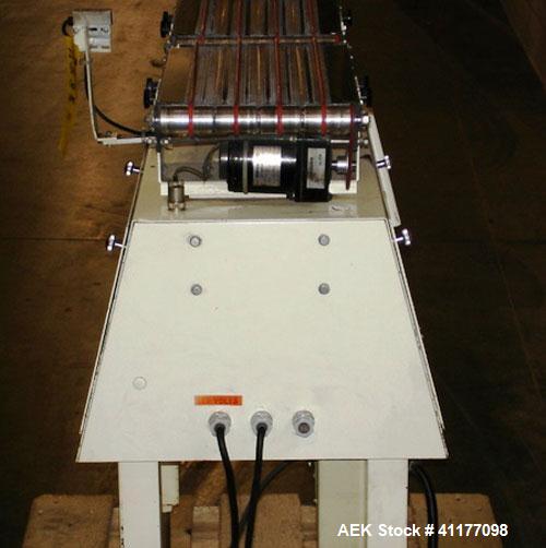 Used Yamato CA15L-00 Checkweigher. Weight range from 10g to 1500g with accuracy of +/- 1 gram. Last weighing cartons of ice cream cones. Dimensions: 31" L x R, 18" wide x 37" high. Belt width is 9".