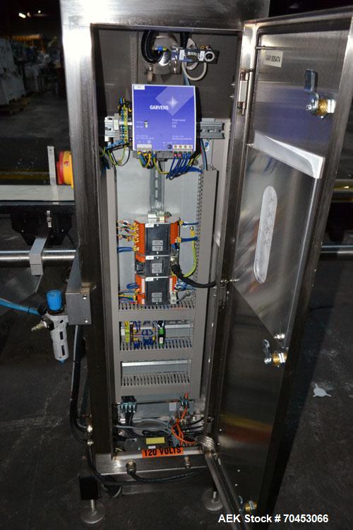 Used Garvens Model E2 Three Belt Checkweigher capable of speeds up to 200 containers per minute. Has a maximum weight range up to 600 grams. Has an air reject. 1/60/110V. Built 2004.