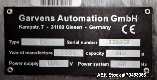 Used Garvens Model E2 Three Belt Checkweigher capable of speeds up to 200 containers per minute. Has a maximum weight range up to 600 grams. Has an air reject. 1/60/110V. Built 2004.