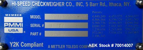 Used Hi Speed Mettler Toledo Container Checkweigher, Model SST1100SS-CM. Stainless steel side belt load cell mechanism with a weight range up to 50 pounds. Capable of speeds up to 250 packages per mi...