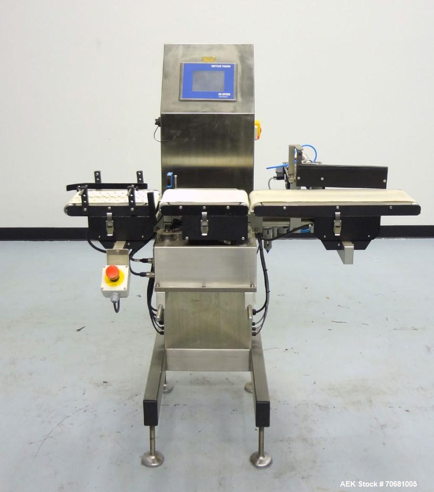 Used Mettler Toledo XE Hi-Speed Checkweigher, Product weight range up to 3 kg, accuracy from +/- 200mg. Maximum line rate speed up to 300 packages per minute, and up to 300 feet per minute. (3) secti...