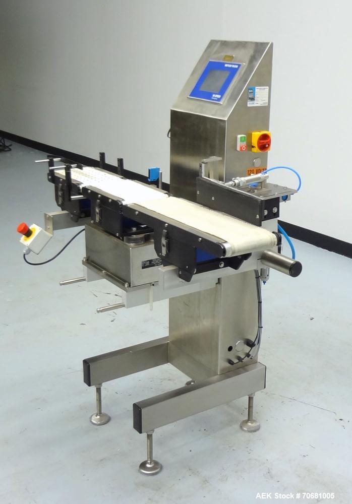 Used Mettler Toledo XE Hi-Speed Checkweigher, Product weight range up to 3 kg, accuracy from +/- 200mg. Maximum line rate speed up to 300 packages per minute, and up to 300 feet per minute. (3) secti...