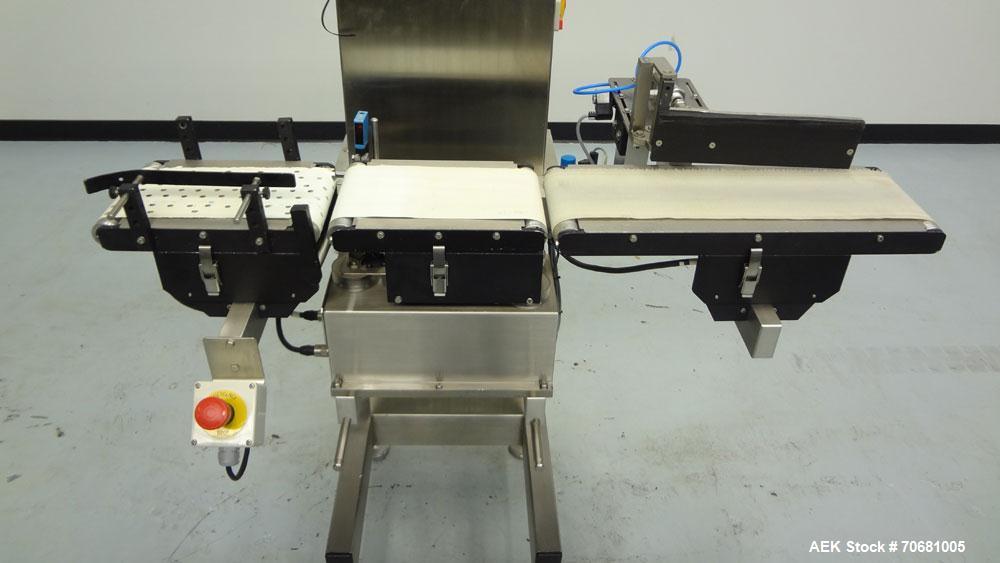 Used Mettler Toledo XE Hi-Speed Checkweigher, Product weight range up to 3 kg, accuracy from +/- 200mg. Maximum line rate speed up to 300 packages per minute, and up to 300 feet per minute. (3) secti...