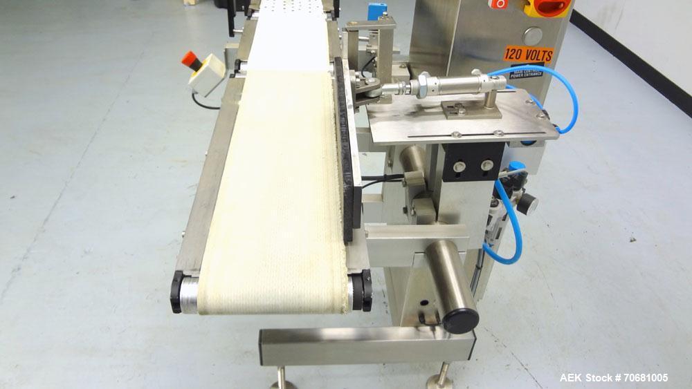 Used Mettler Toledo XE Hi-Speed Checkweigher, Product weight range up to 3 kg, accuracy from +/- 200mg. Maximum line rate speed up to 300 packages per minute, and up to 300 feet per minute. (3) secti...