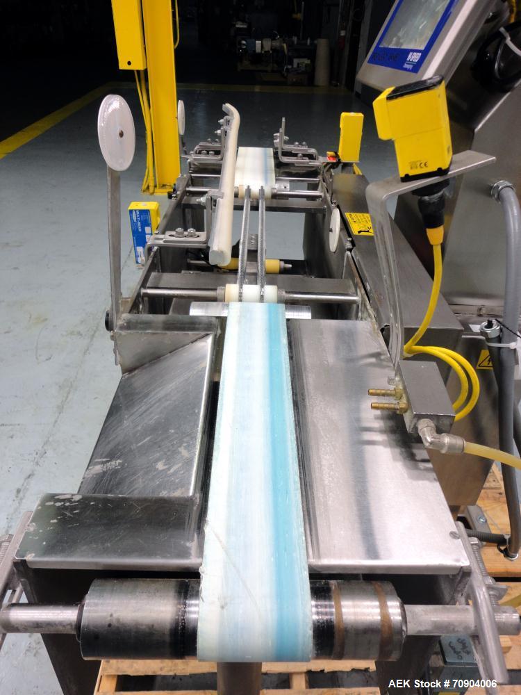 Used Mettler Toldeo XS Hi Speed Chain Checkweigher, Model CM9400-CM. Has the capacity to weigh up to 50 lbs., with a weigh pan length of 13". Currently set up to run 140 PPM, for carton size of 5.38"...