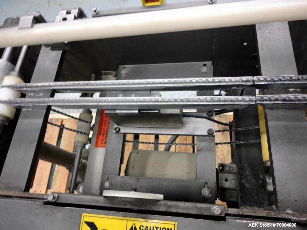 Used Mettler Toldeo XS Hi Speed Chain Checkweigher, Model CM9400-CM. Has the capacity to weigh up to 50 lbs., with a weigh pan length of 13". Currently set up to run 140 PPM, for carton size of 5.38"...